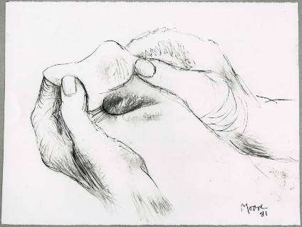 Artist's Hands Holding Bone