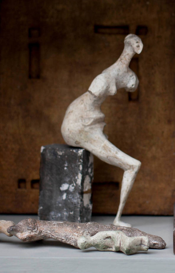 Maquette for Girl Seated against Square Wall
