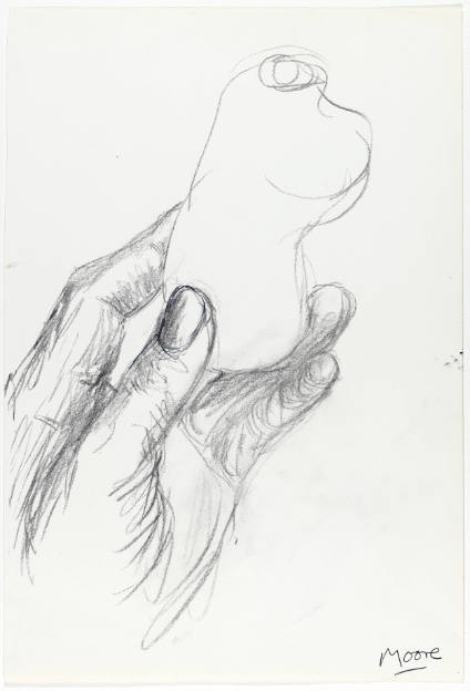 Artist's Left Hand Holding Pebble