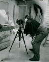 Henry Moore in the Top Studio, Perry Green, photographing <i>Standing Figure No.4</i> 1952 (bro…