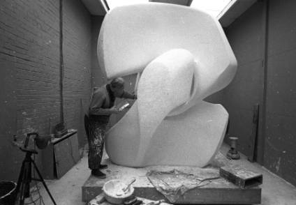 Henry Moore working on the plaster <i>Locking Piece</i> in his studio, <i>c</i>.1963.