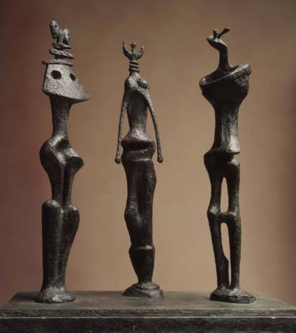 Three Standing Figures