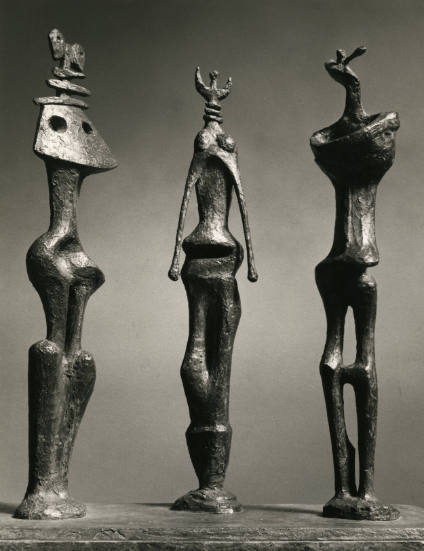 Three Standing Figures