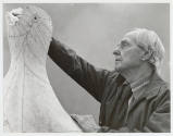 Henry Moore with the plaster Reclining Figure: Festival (LH 293). Photo: Bo Boustedt