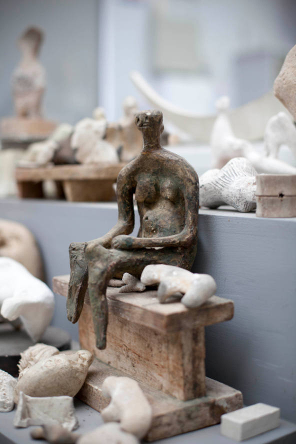 Seated Figure on Ledge