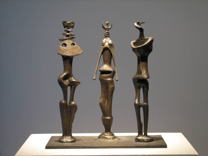 Three Standing Figures