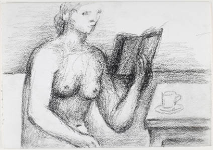 Woman Reading Book at Table