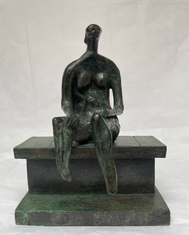 Seated Figure on Ledge